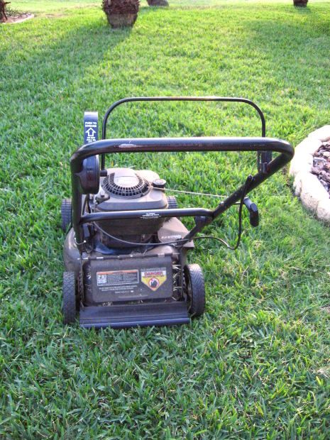 Gas lawn mower. Photo by o0o0xmods0o0o at Morguefile.com
