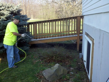 Perimeter pest control spraying. | Tom Morgan, Owen Tree Service